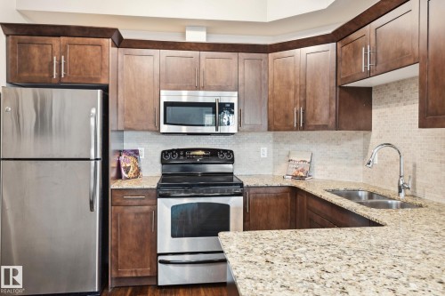 402 10524 77 Avenue, Edmonton, AB - Indoor Photo Showing Kitchen With Double Sink With Upgraded Kitchen