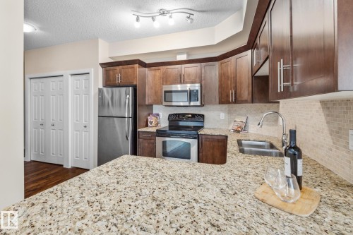 402 10524 77 Avenue, Edmonton, AB - Indoor Photo Showing Kitchen With Double Sink