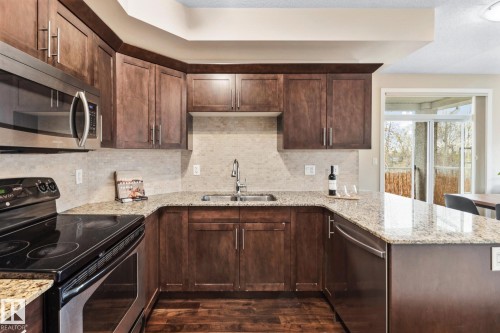 402 10524 77 Avenue, Edmonton, AB - Indoor Photo Showing Kitchen With Double Sink With Upgraded Kitchen
