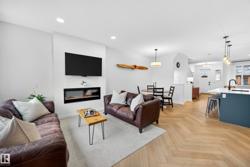 3847 Chrustawka Place, Edmonton, AB - Indoor Photo Showing Living Room With Fireplace