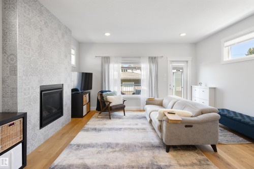 8534 81 Avenue, Edmonton, AB - Indoor Photo Showing Living Room With Fireplace