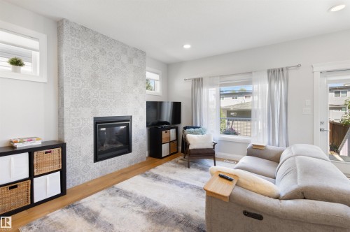 8534 81 Avenue, Edmonton, AB - Indoor Photo Showing Living Room With Fireplace