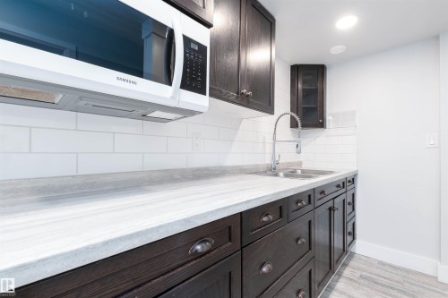 8534 81 Avenue, Edmonton, AB - Indoor Photo Showing Kitchen With Double Sink