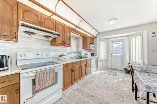3135 34B Avenue Nw, Edmonton, AB - Indoor Photo Showing Kitchen With Double Sink