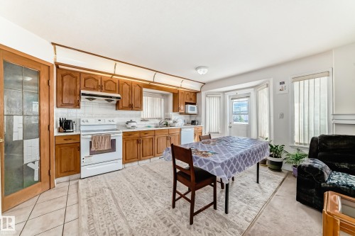 3135 34B Avenue Nw, Edmonton, AB - Indoor Photo Showing Kitchen With Double Sink