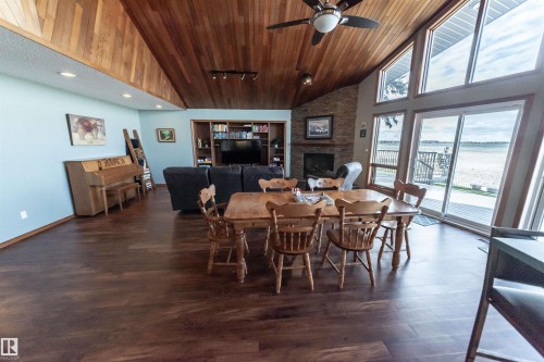5123 51 Avenue, Rural Lac Ste. Anne County, AB - Indoor Photo Showing Dining Room With Fireplace