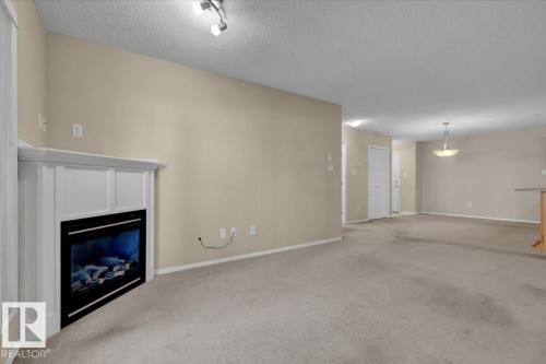 140 16035 132 Street, Edmonton, AB - Indoor With Fireplace