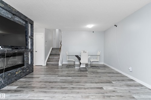 3214 71 Street, Edmonton, AB - Indoor With Fireplace
