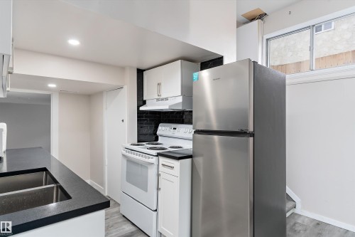 3214 71 Street, Edmonton, AB - Indoor Photo Showing Kitchen With Double Sink