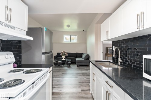 3214 71 Street, Edmonton, AB - Indoor Photo Showing Kitchen With Double Sink