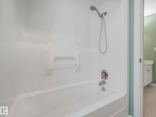 Bathroom with shower / bathtub combination and vanity - 316 Burton Road, Edmonton, AB - Indoor Photo Showing Bathroom