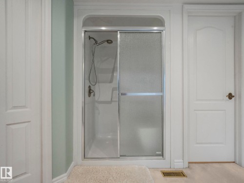 Bathroom featuring a stall shower - 316 Burton Road, Edmonton, AB - Indoor Photo Showing Bathroom