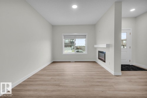 1081 Berg Place, Leduc, AB - Indoor With Fireplace