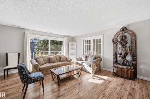 204 14810 51 Avenue, Edmonton, AB - Indoor Photo Showing Living Room