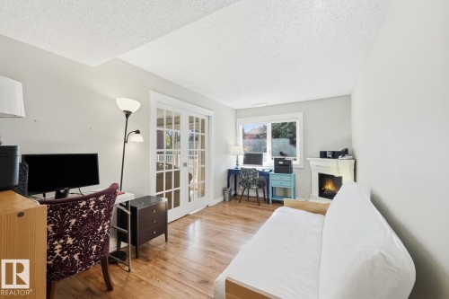 204 14810 51 Avenue, Edmonton, AB - Indoor With Fireplace