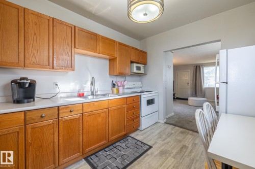 13126 64 Street, Edmonton, AB - Indoor Photo Showing Kitchen With Double Sink