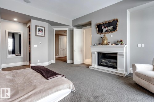 4311 Westcliff Landing Landing, Edmonton, AB - Indoor Photo Showing Living Room With Fireplace