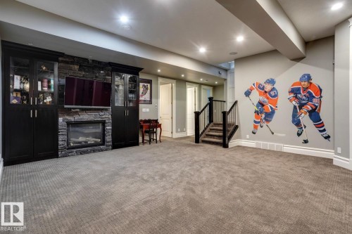 4311 Westcliff Landing Landing, Edmonton, AB - Indoor Photo Showing Other Room With Fireplace