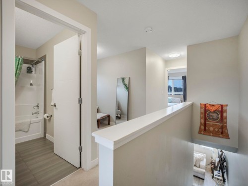 124 2560 Pegasus Boulevard, Edmonton, AB - Indoor Photo Showing Other Room