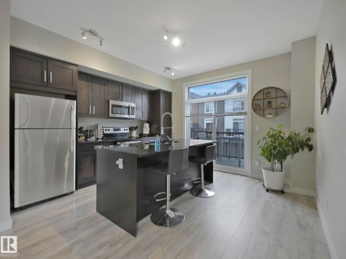 124 2560 Pegasus Boulevard, Edmonton, AB - Indoor Photo Showing Kitchen With Upgraded Kitchen