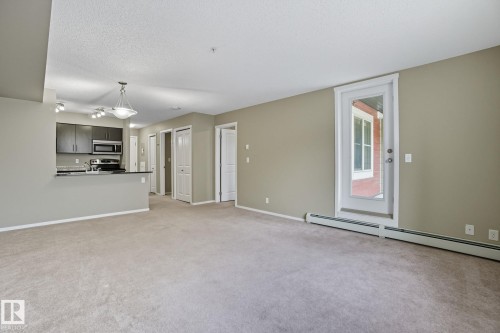 125 3315 James Mowatt Trail, Edmonton, AB - Indoor Photo Showing Other Room