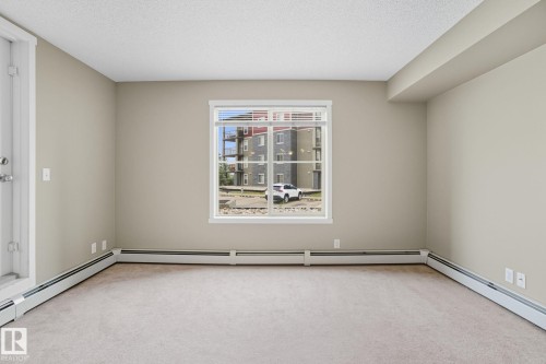 125 3315 James Mowatt Trail, Edmonton, AB - Indoor Photo Showing Other Room