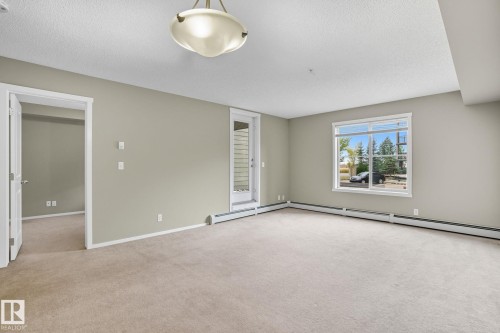 125 3315 James Mowatt Trail, Edmonton, AB - Indoor Photo Showing Other Room