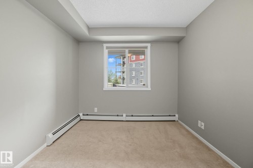 125 3315 James Mowatt Trail, Edmonton, AB - Indoor Photo Showing Other Room