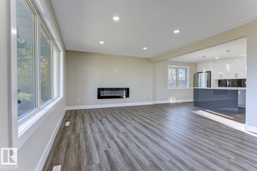 12904 95A Street, Edmonton, AB - Indoor Photo Showing Living Room With Fireplace