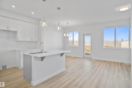 11 Tenuto Link, Spruce Grove, AB - Indoor Photo Showing Kitchen With Upgraded Kitchen