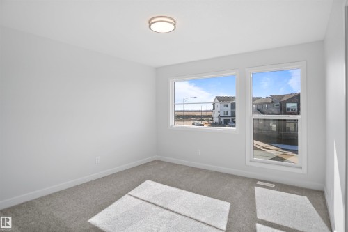 11 Tenuto Link, Spruce Grove, AB - Indoor Photo Showing Other Room
