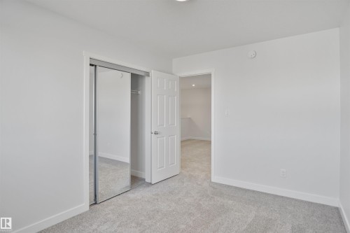 11 Tenuto Link, Spruce Grove, AB - Indoor Photo Showing Other Room