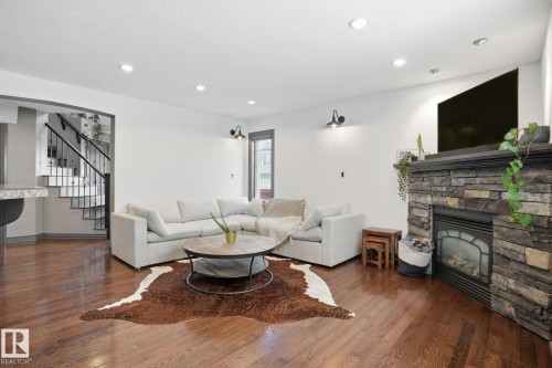 47 Hilldowns Drive, Spruce Grove, AB - Indoor Photo Showing Living Room With Fireplace