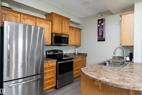 408 14259 50 Street, Edmonton, AB - Indoor Photo Showing Kitchen With Double Sink