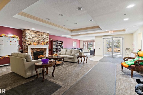 408 14259 50 Street, Edmonton, AB - Indoor With Fireplace