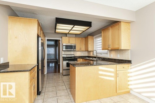 1051 109 Street, Edmonton, AB - Indoor Photo Showing Kitchen With Stainless Steel Kitchen