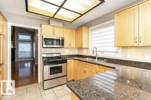 1051 109 Street, Edmonton, AB - Indoor Photo Showing Kitchen With Double Sink