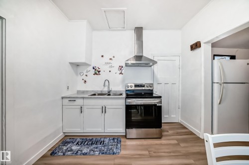 11331 92 Street, Edmonton, AB - Indoor Photo Showing Kitchen With Double Sink