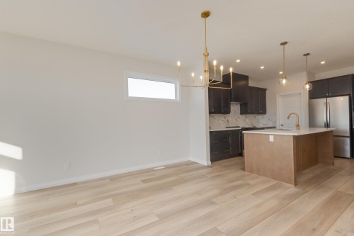 172 Stonehouse Way, Leduc, AB - Indoor Photo Showing Kitchen With Stainless Steel Kitchen With Upgraded Kitchen