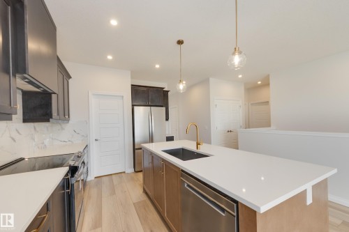 172 Stonehouse Way, Leduc, AB - Indoor Photo Showing Kitchen With Stainless Steel Kitchen With Upgraded Kitchen