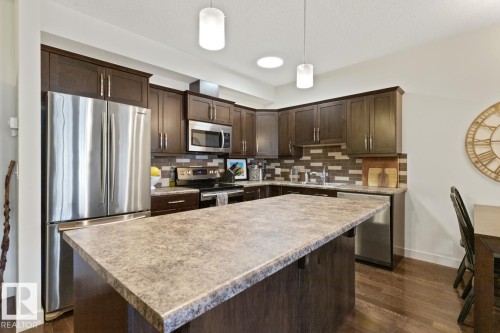114 10520 56 Avenue, Edmonton, AB - Indoor Photo Showing Kitchen With Stainless Steel Kitchen With Upgraded Kitchen
