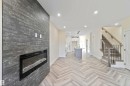 8319 81Ave, Edmonton, AB  - Indoor Photo Showing Other Room With Fireplace 