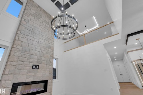 151 Graybriar Drive, Stony Plain, AB - Indoor Photo Showing Other Room With Fireplace