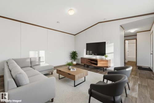 242 305 Calahoo Road, Spruce Grove, AB - Indoor Photo Showing Living Room