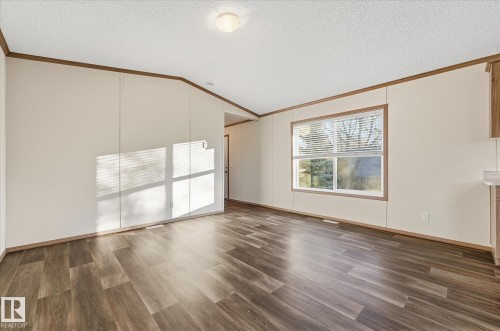 242 305 Calahoo Road, Spruce Grove, AB - Indoor Photo Showing Other Room With Fireplace