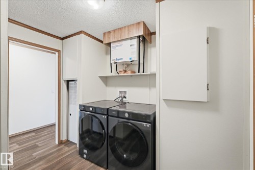 242 305 Calahoo Road, Spruce Grove, AB - Indoor Photo Showing Laundry Room