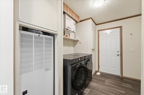 242 305 Calahoo Road, Spruce Grove, AB - Indoor Photo Showing Laundry Room