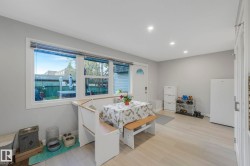 Dining area featuring recessed lighting and light wood-type flooring - 