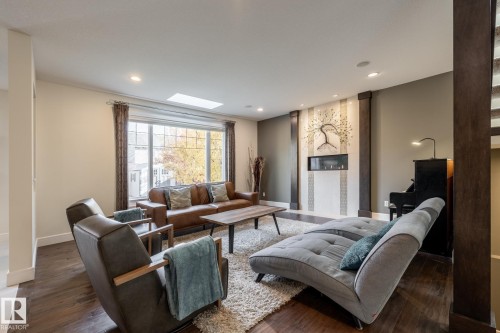 75 Nadine Way, St. Albert, AB - Indoor Photo Showing Living Room With Fireplace