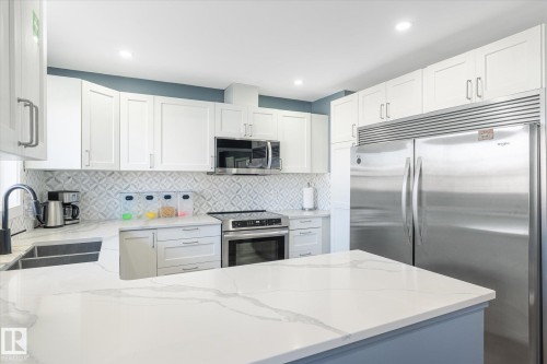 12707 92 Street, Edmonton, AB - Indoor Photo Showing Kitchen With Stainless Steel Kitchen With Double Sink With Upgraded Kitchen